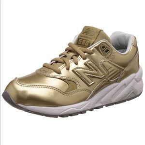New Balance Women’s Gold Sneakers
